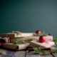 gift boxes with red baubles on top