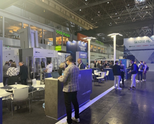 Visitors on the CMS stand at Glasstec 2026 in Düsseldorf
