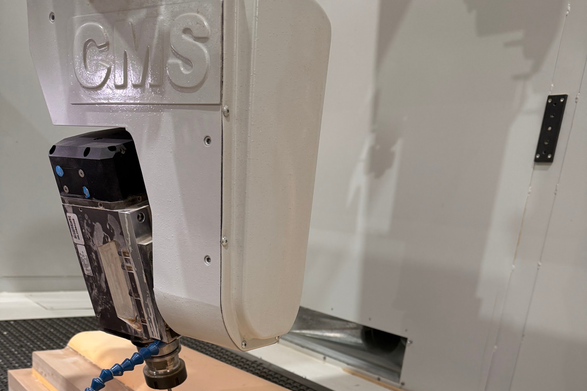 CMS Athena 5 axis CNC machining a timber plug at Maritimo