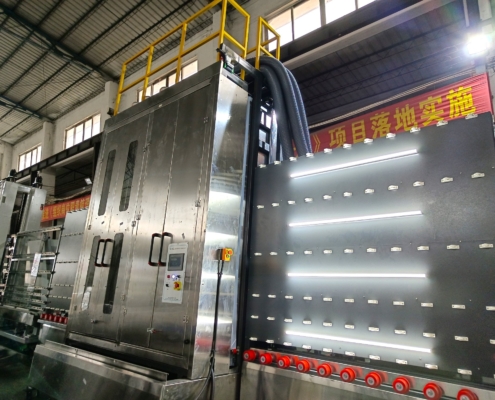 Techwin vertical glass washing machine processing a large glass panel